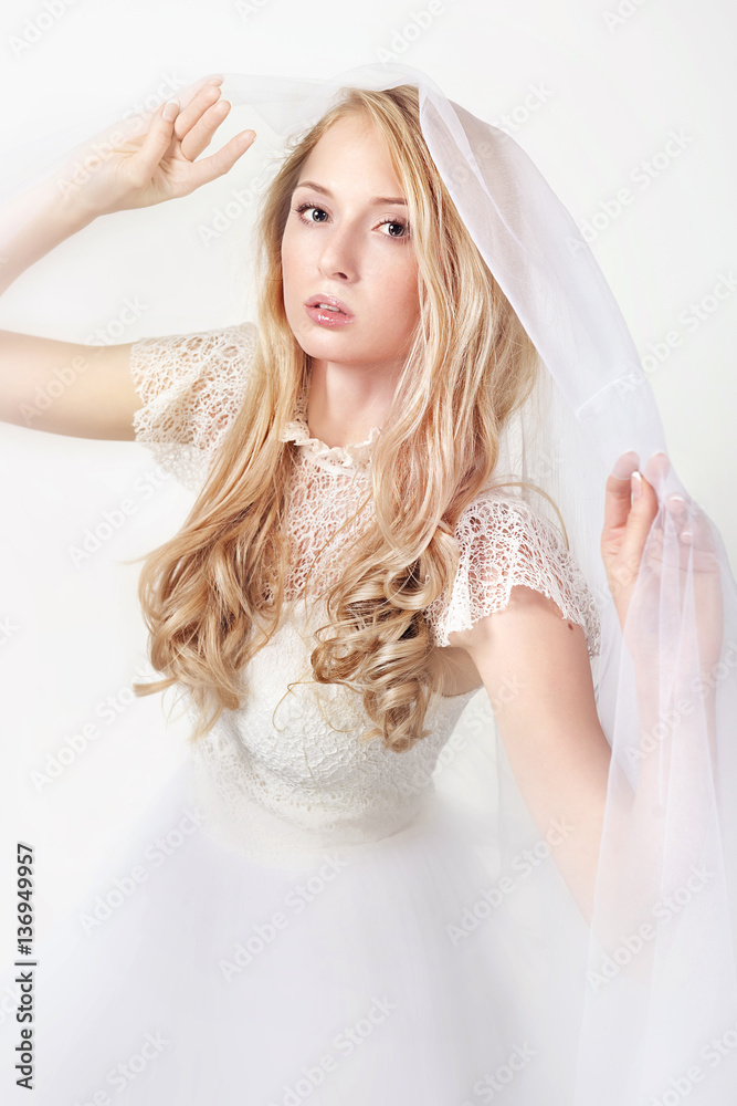 portrait of a beautiful girl on a light background
