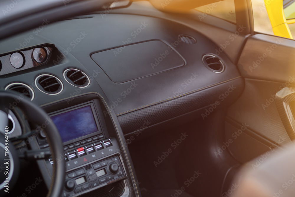 Steering wheel and interior view of car. dashboard with fade style