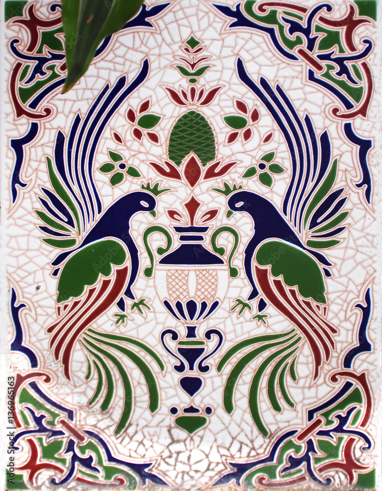 Fototapeta premium Detail of the traditional tiles from facade of old house. Decorative tiles.Spain traditional tiles. Floral ornament. Majolica, Watercolor. Valencia.
