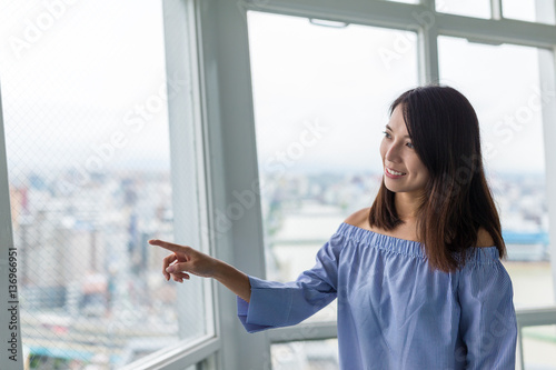 Woman viewing the city in lookout