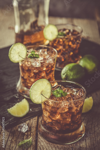 Rum and cola cocktail in glasses