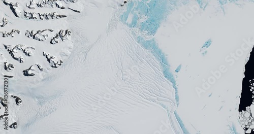 High-altitude overflight aerial of the Scar Inlet Ice Shelf and Larsen embayment, Antarctica. Clip loops and is reversible. Elements of this image furnished by USGS/NASA Landsat photo