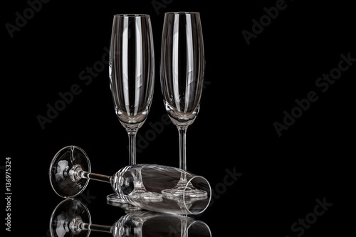 Champagne glasses isolated on black