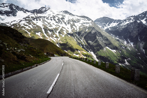 Winding road on alpine landscape