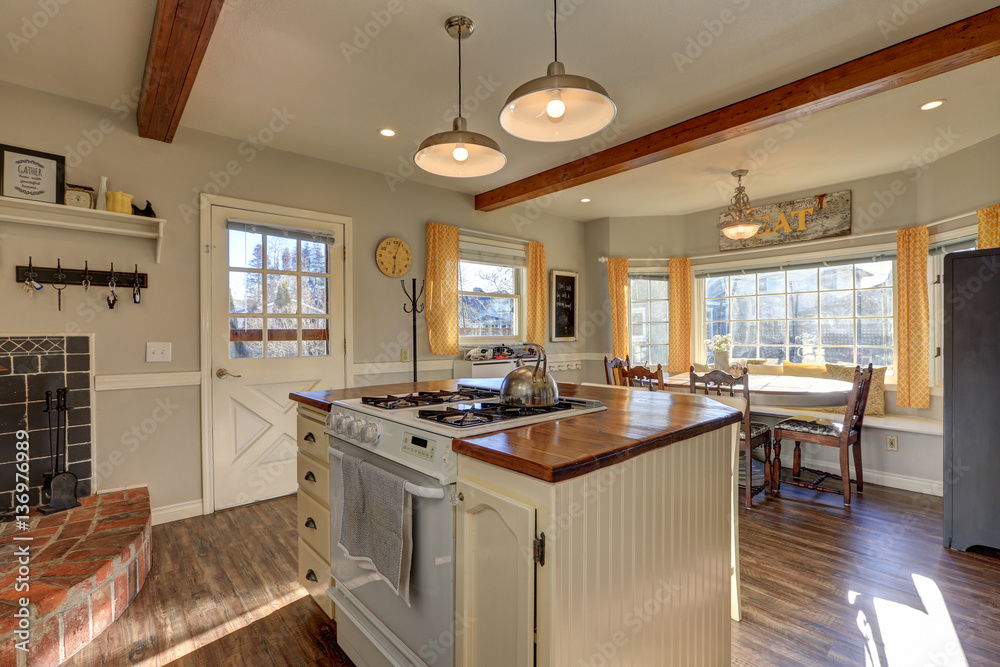 Fototapeta premium Newly renovated Kitchen boasts wood beams on ceiling