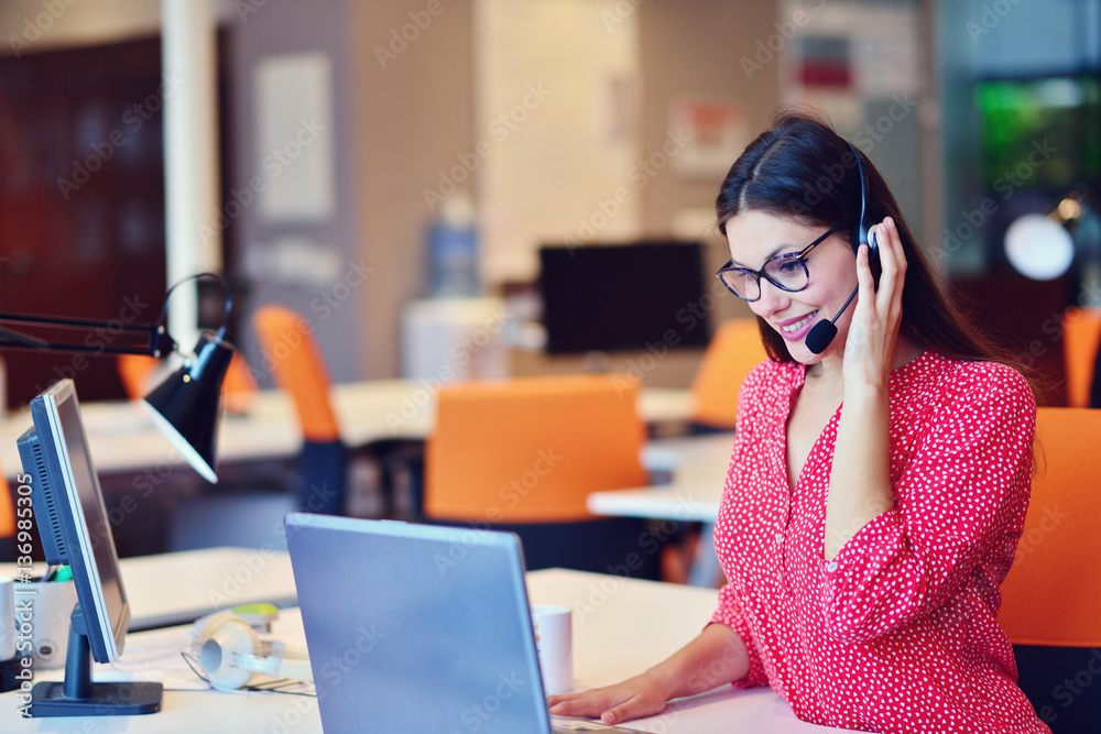 Young female in call center team Young female in call center team