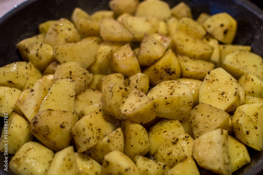 Cooking fried potatoes with spicies Cooking fried potatoes with spicies