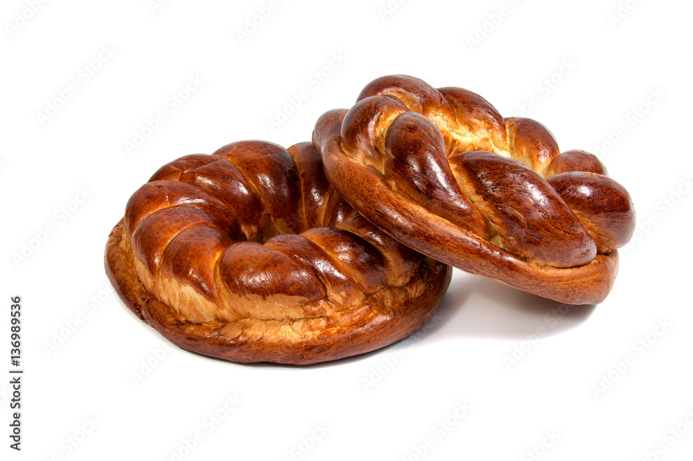 Christmas bread (kalach), traditional Christmas dish in Ukraine over wooden background Christmas bread (kalach), traditional Christmas dish in Ukraine over wooden background