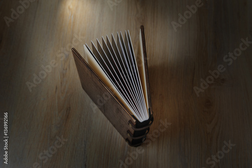 photobook on a wooden background