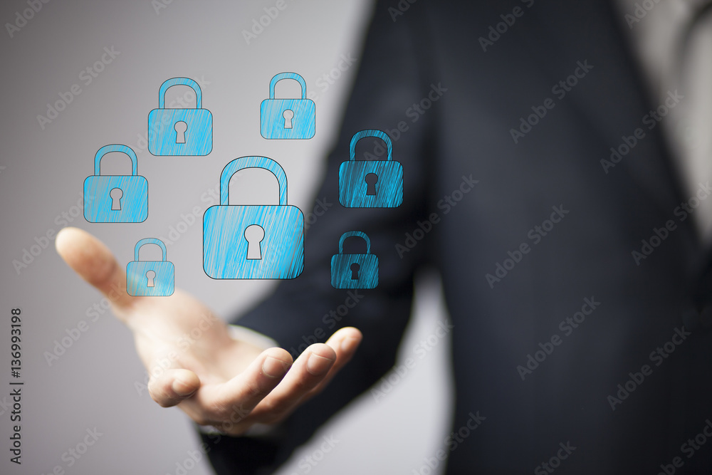 businessman hand locks in screen businessman hand locks in screen