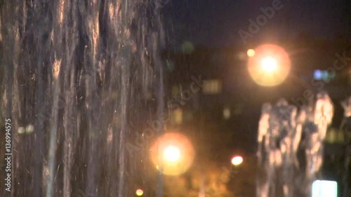 Fountain in a city during the evening hours