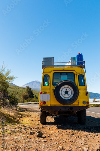 Yellow car in Teide National Park in Tenerife, Canary Islands © dtatiana