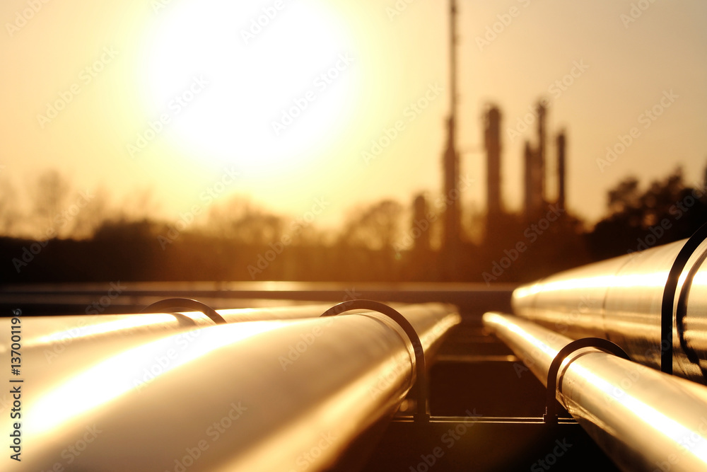 golden steel pipe network in crude oil refinery Stock Photo | Adobe Stock