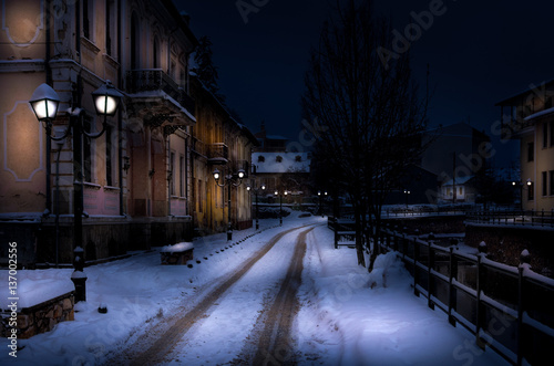 Winter night scene by the river of Florina, Greece, with snow