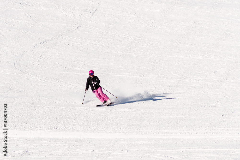 Female skier on empty ski slope Female skier on empty ski slope