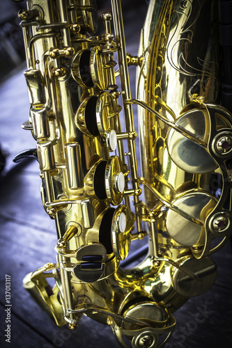 Golden alto saxophone closeup photo