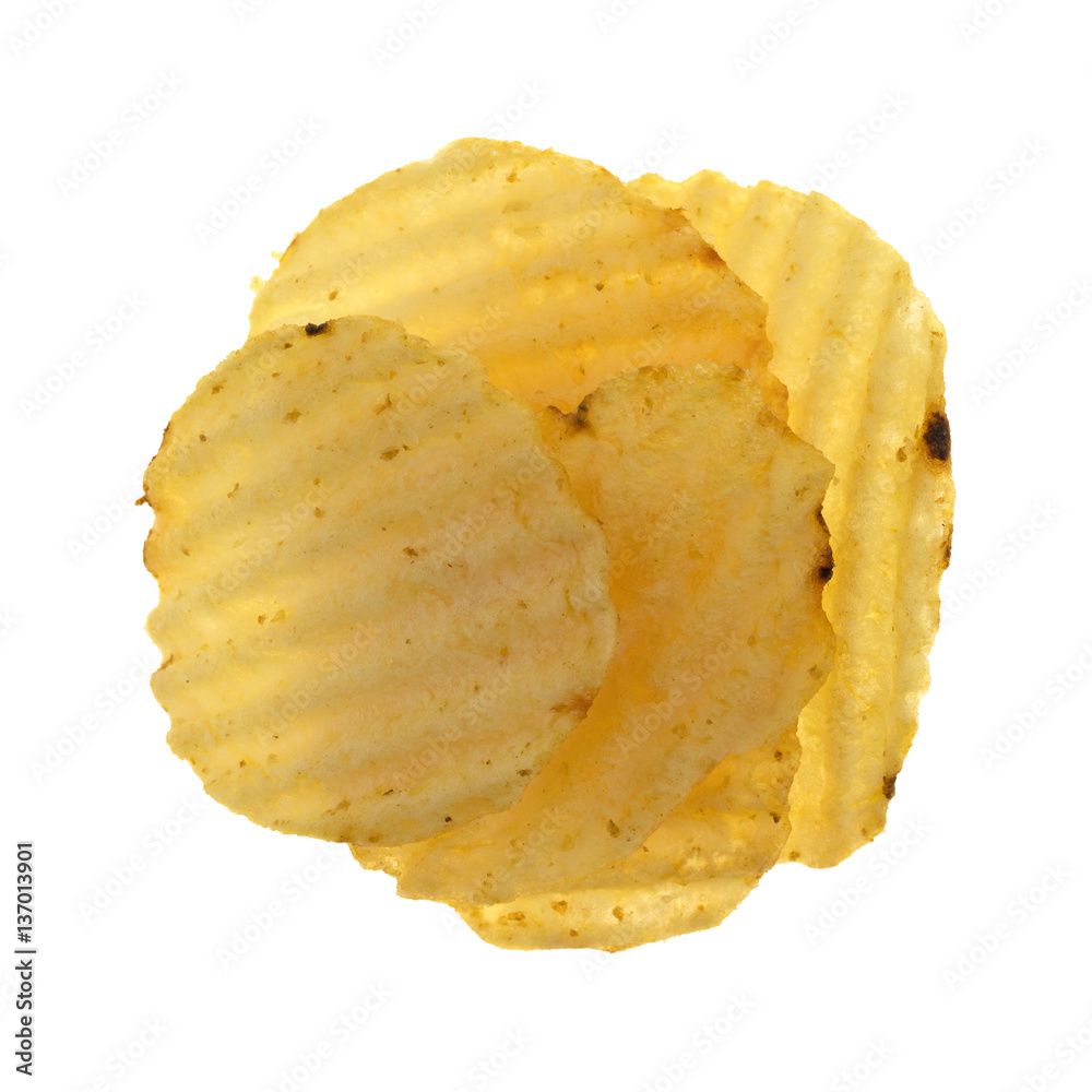 Top view of several wavy potato chips isolated on a white background. Top view of several wavy potato chips isolated on a white background.