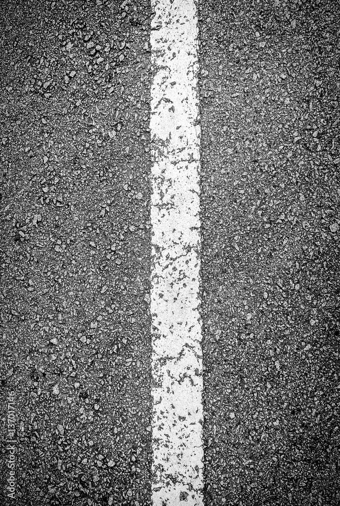 White line on black asphalt road