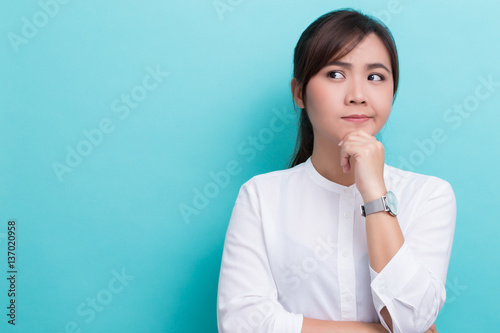 Fotografie, Obraz Asian woman thinking on isolated background