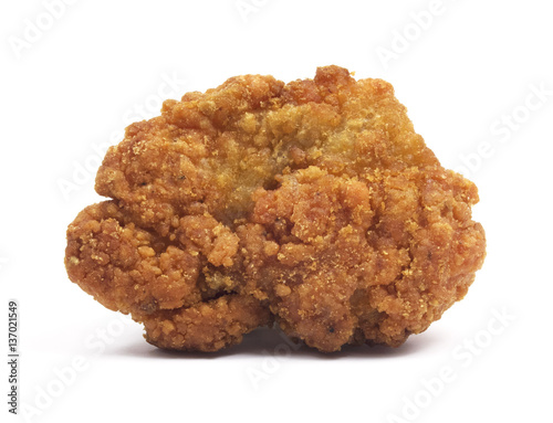 Isolated chicken nugget on a white background.
