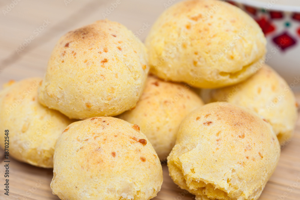 Pandebono preparation : Just baked pandebonos and cofee Pandebono preparation : Just baked pandebonos and cofee