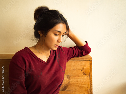 Asian woman sitting on the chair