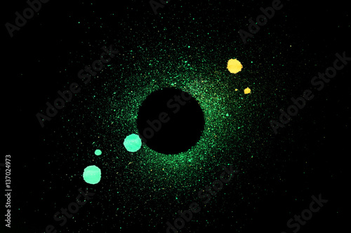 Fototapeta Naklejka Na Ścianę i Meble -  circle with green ink blots. isolated on black