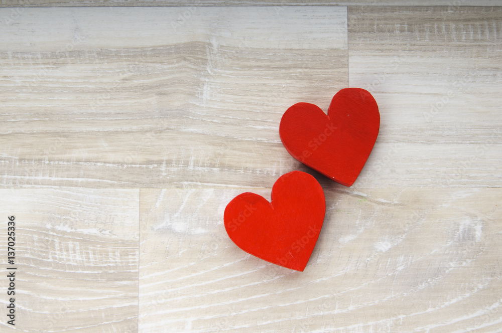 two hearts on white wooden background two hearts on white wooden background
