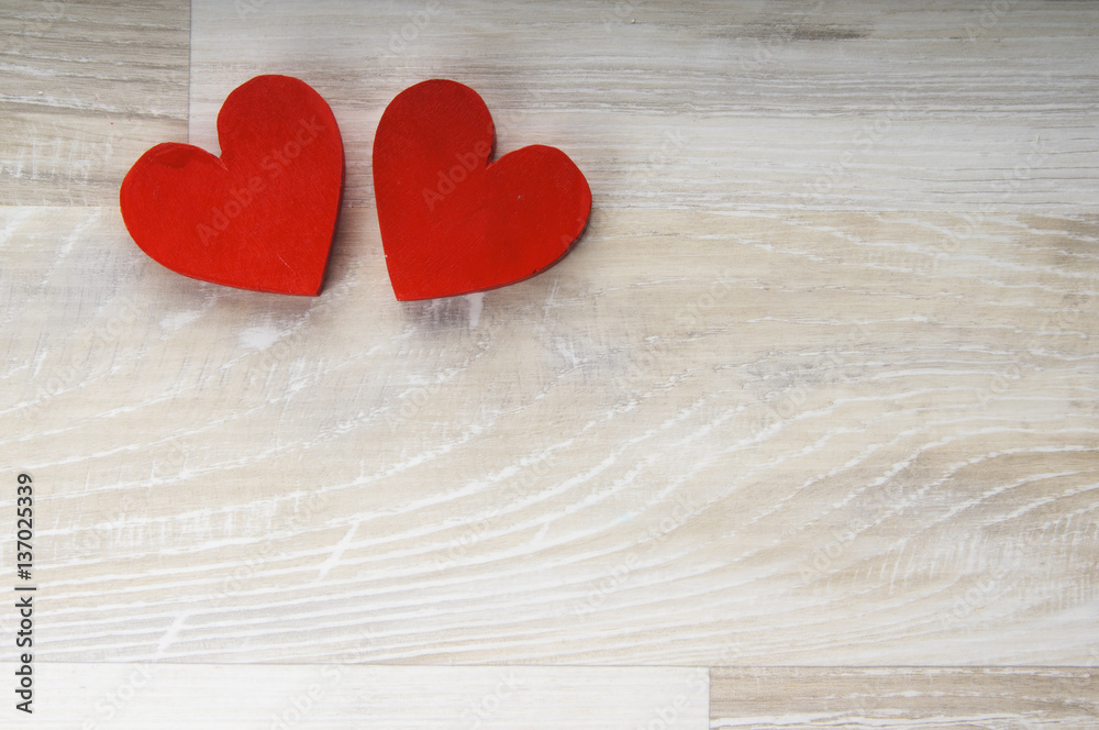two hearts on white wooden background two hearts on white wooden background