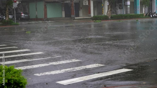 4k Extreme Wind And Rain During A Super Typhoon Megi. A Street Taipei city with the strong hurricane winds in asian road. -Dan photo