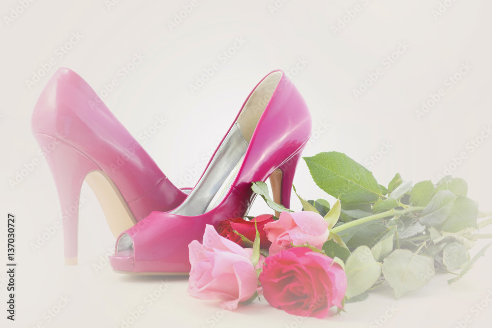 Pink high heel shoes with roses. Pink high heel shoes with roses.