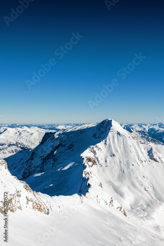 Sunny view of Austrian Alps from viewpoint of ski resort Zillertal Hintertuxer Glacier, Tirol, Austria. © Neonyn