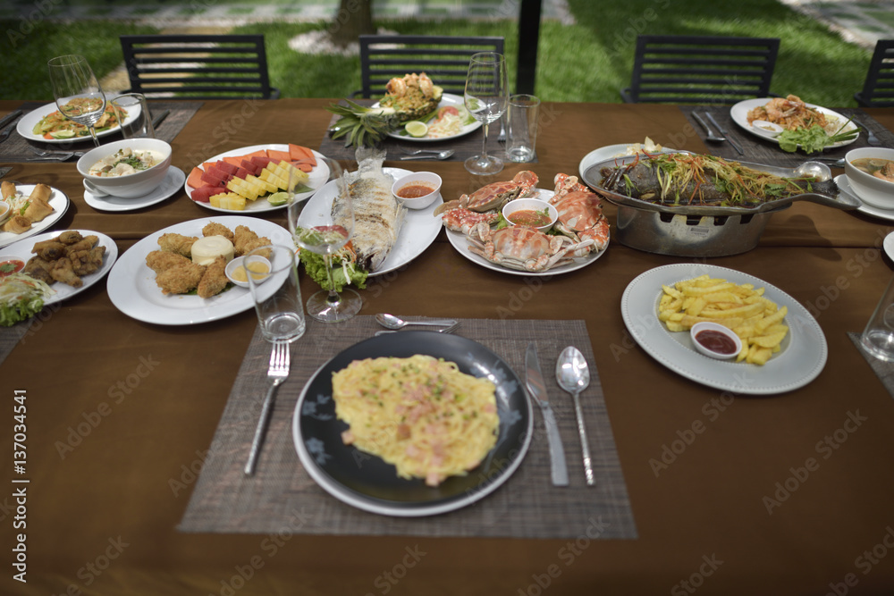 Delicious food set mixed full on the table in restaurant