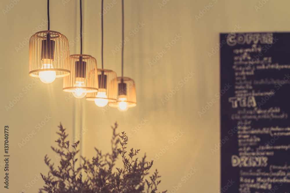 cafe decoration closeup hanging lighting interior design of coffee shop.