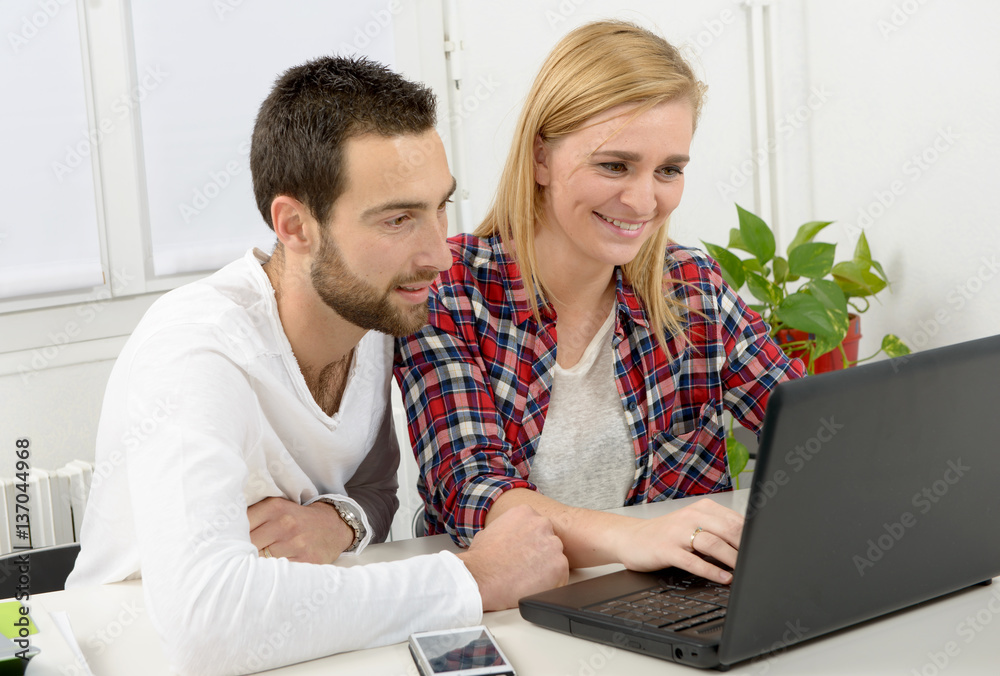 attractive man and woman business using laptop computer attractive man and woman business using laptop computer