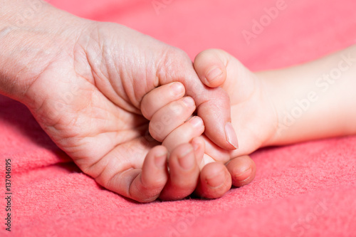 Holding child hand