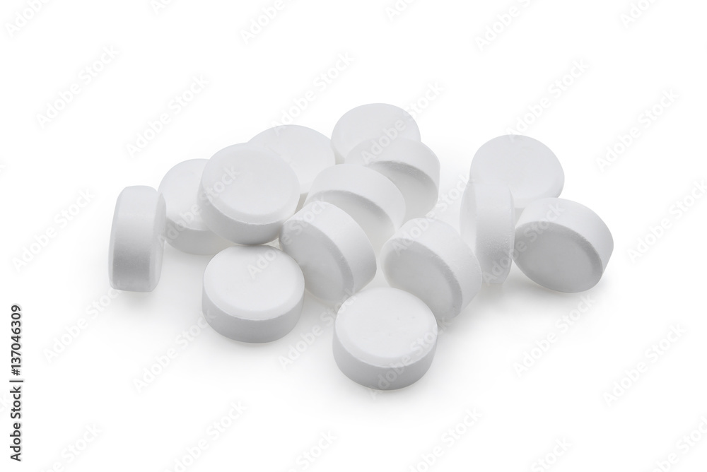 white pills isolated on white background white pills isolated on white background