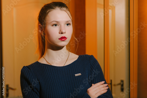 portrait of the blonde girl in dark tones