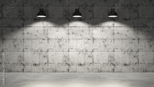 Concrete wall with three lamps hanging