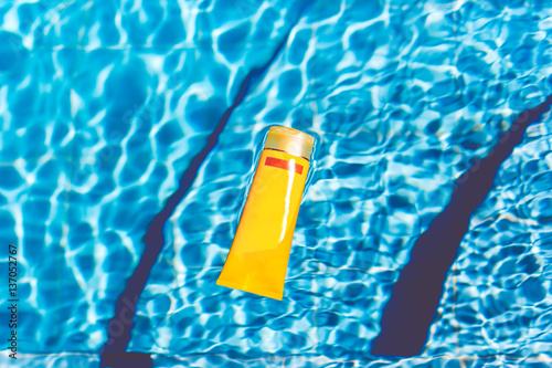 Sunscreen lotion in swimming pool