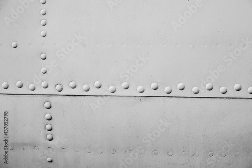 Aircraft metal plating texture with rivets