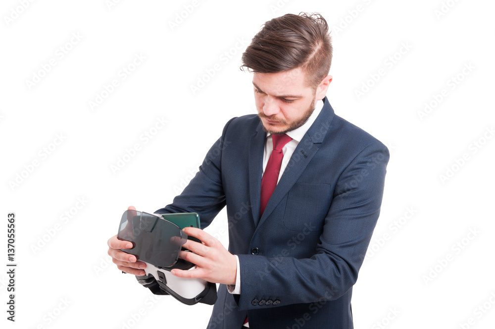Businessman with headset and smartphone with VR Businessman with headset and smartphone with VR