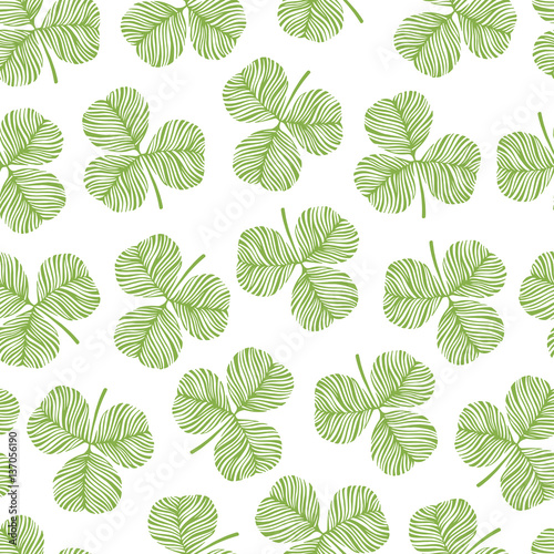Trendy seamless pattern with clover leaves.