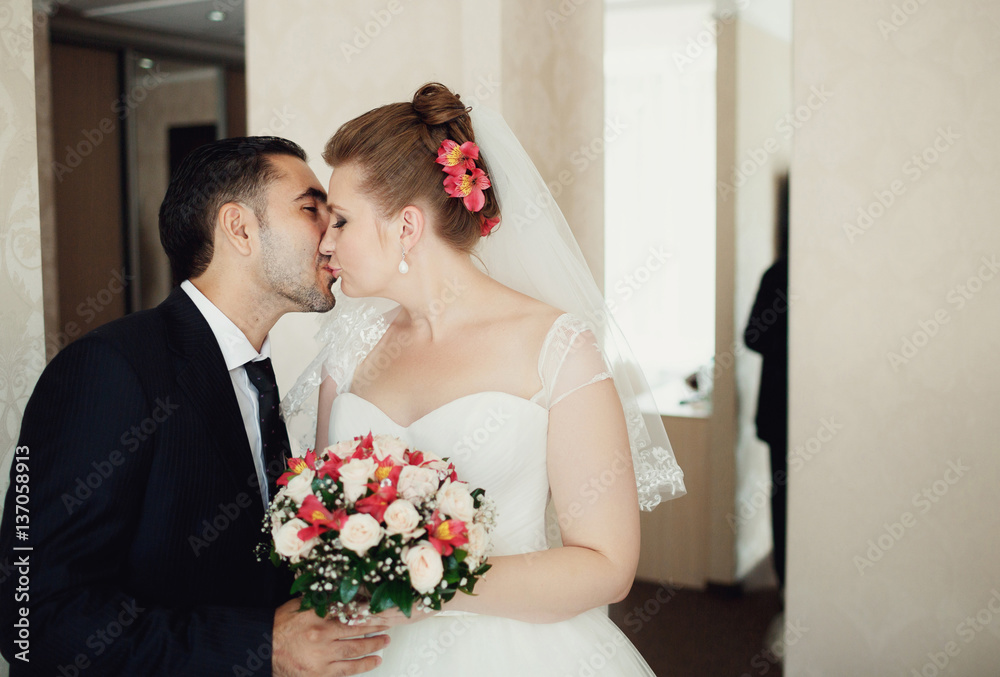 Brides kissing in the room Brides kissing in the room