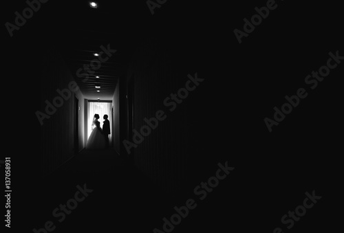 Brides  are in  long corridor