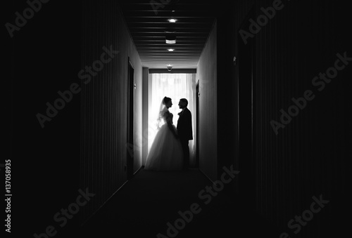 Brides  are in  long corridor
