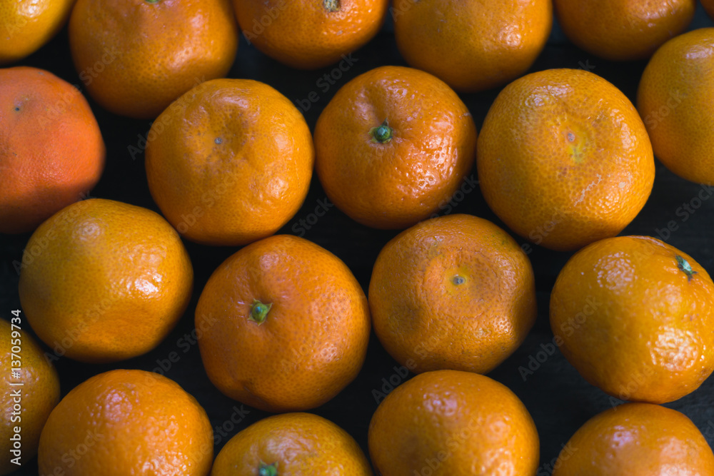 Fresh tangerine on a wooden background Fresh tangerine on a wooden background