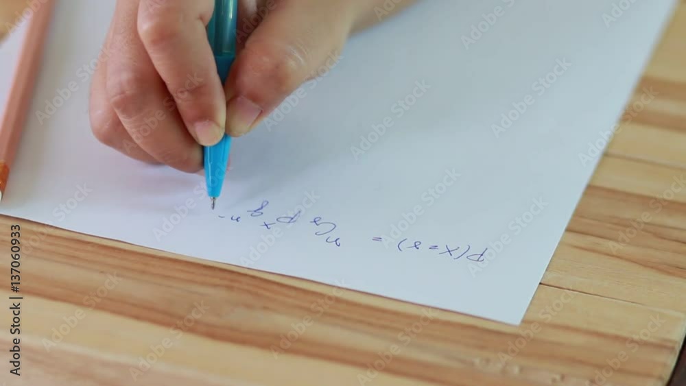 Student testing in exercise, exams trying to solve a mathematical equation, advanced mathematics (maths). Student testing in exercise, exams trying to solve a mathematical equation, advanced mathematics (maths).