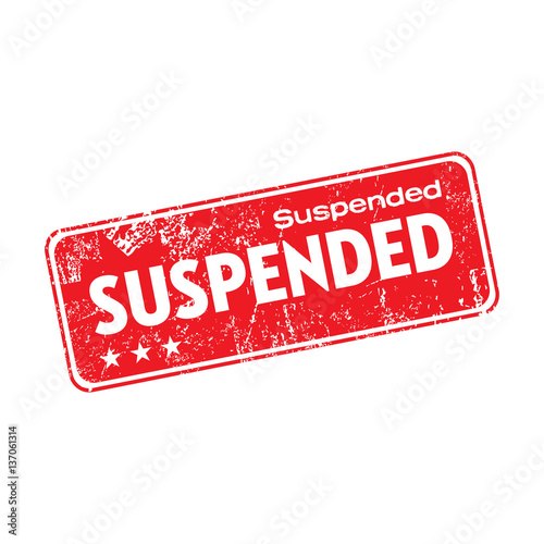 Red grunge rubber stamp with the word suspended written inside the stamp