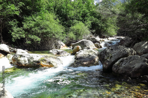 Aigüestortes National Park in the Catalan Pyrenees, Spain. The main crest of Pyrenees forms a divide between France and Spain, with the microstate of Andorra sandwiched in between